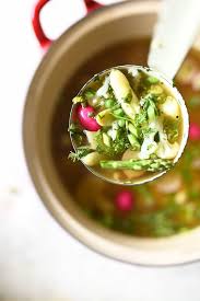 Spring Vegetable Soup With Basil Pistou Serving Dumplings Recipe In 2020 Spring Vegetables Vegetable Soup Spring Soups
