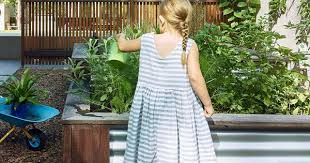 A raised garden bed provides drainage so your plants don't get their feet wet. Raised Garden Beds How To Create And Fill Them Homes To Love