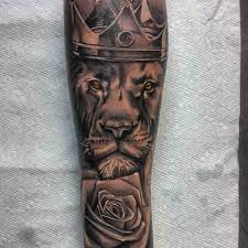 Today lion tattoos signify the same things plus courage savage protectiveness glory victory strength vitality spirit and overall masculinity. King Lion With Crown And Rose Tattoo On Sleeve