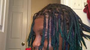 For an extremely bold, undeniable look, you can't do wrong with these dyed dreads. 2 Ponytail Dreads Men Novocom Top