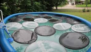 Best Black Garbage Bags To Heat Pool The Cheap Way Poolsplanet Homemade Pool Heater Homemade Swimming Pools Homemade Pools
