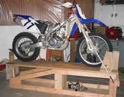 Sloped, to facilitate mounting the motorcycle on the lift, and flat, to serve as a work surface after pivoting. Homemade Motorcycle Lift Homemade Motorcycle Diy Motorcycle Motorcycle