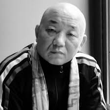 Cui Baoyin (Brother Sway) at party in a restaurant in Manhattan — Calisphere