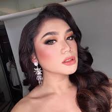 Maria Precious Gruspe is a 21-year-old Negrense beauty queen. She won  several pageants, Aside from being in the pageant arena, she is also an  Environmental Advocate and Defender, an Artist, Fashion Designer,