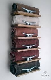 20 Really Inspiring Diy Towel Storage Ideas For Every Small Bathroom Nautical Towel Diy Towels Beach House Decor