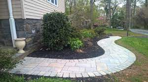 At this point, you'll have laid a curved paving stone walkway. Walkways Portfolio Whitehouse Landscaping