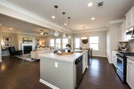View From The Kitchen To The Family Room In Our Popular Buffington Floor Plan Openlayout Model Home Featured In Charlo New Home Builders Home Builders Home