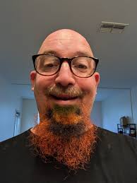 Create pumpkin stencil of his face?