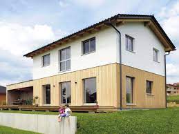 holzhaus in st gotthard tannenkleid als ruhender sockel fur das gebaude haus architektur style at home