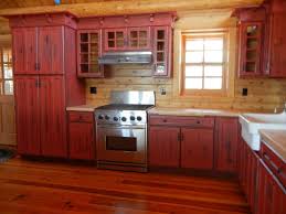 log cabin red kitchen cabinets rustic