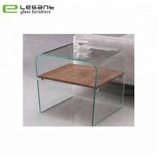 It includes a square glass top and a durable, thick wooden shelf in the bottom area. China 12 Mm Thick Glass Side Table Furniture With Plywood China Coffee Table Tea Table