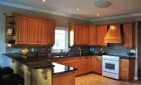 Uba tuba granite with light hioney oak cabinets. Uba Tuba Granite Countertops Pictures Cost Pros Cons
