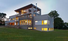 These are fiberglass concrete metal and wood. Jetson Green Prefab Fishers Island House Steps Up The Modern Modular To Luxury Vacation Living