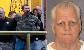 PICTURED: Murderer's son is arrested for lashing out during his execution