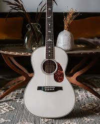 The original, general term for this stringed instrument is guitar, and the retronym 'acoustic guitar' distinguishes it from an electric guitar. Se P20e Antique White Prs Guitars