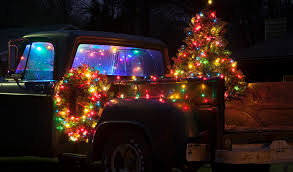 Many people like to put on christmas music and drink wine as they decorate their tree with ornaments. Christmas Truck Decorating For The Holidays