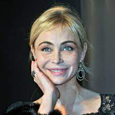 The angel, as a godbeings, her beautiful must be holy, not sexy, not dressed with belly button uncovered, or super short skirt. Emmanuelle Beart Paris Match