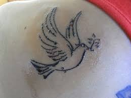 Small dove with red heart tattoos. 134 Interesting Dove Tattoos Creativefan