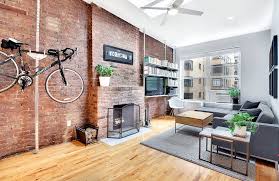 When you appreciate the cabin style created by abundant wood features, running hardwood flooring throughout a home full of paneled walls seems like the obvious choice. Living Room Flooring Ideas Top Interior Designs Designing Idea