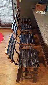 There are a few flaws in the upholstery which we have patched and touched up to preserve. Whiskey Barrel Stave Bar Stools Made Entirely Of Whiskey Etsy Whiskey Barrel Furniture Barrel Stave Barrel Stave Bar