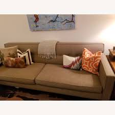 This section of the page contains a carousel that visually displays various linked images one at a time. Room Board Andre Sofa Aptdeco