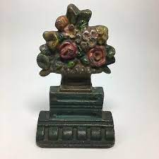 These trace minerals in iron gives more elasticity and flexibility in casting. Metalware Door Stop Flowers Vatican