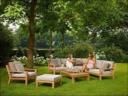 timber loungeset naturel teak muisgrijs tuinbank grijze kussens teakhout