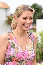 Rachel Riley looks effortlessly chic in a stunning floral gown as she steps  out with husband Pasha Kovalev at the Southport Flower Show