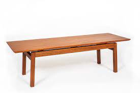 A side view of the table showing the floating of the table top and drawer box, as well as the maple details on the. Hand Crafted Mahogany Quarter Sawn Sapele Floating Top Coffee Table By Ben Newman Furniture Custommade Com
