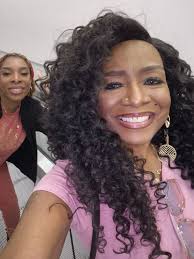 Is herdress at the resort selling photo shoots?