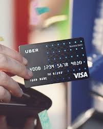 Go to payoneer.com and click register button. The Uber Visa Debit Card