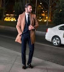 Worn more casually, particularly if the jacket is worn separately with lighter slacks, a navy suit becomes a piece of social wear suitable for any relaxed. Navy Suit With Camel Overcoat Outfits 35 Ideas Outfits Lookastic