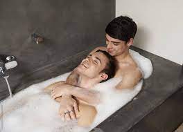 Gay Couple Having Fun Bathing Together