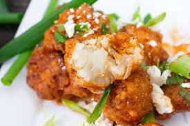 Buffalo Cauliflower Bites Cpk Inspired Recipe Cauliflower Bites Buffalo Cauliflower Recipes Buffalo Cauliflower Bites