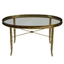 Designer coffee tables for living room and end table that can be used as side table, wooden coffee table with bamboo frame. Mastercraft Oval Faux Bamboo Brass And Glass Coffee Table Coffee Table Glass Coffee Table Oval Coffee Tables
