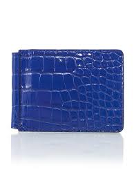 This money clip card case is made with full grain leather, and features a magnetic money clip so you can easily snap in your cash and be on your way. Money Clip Wallet Blue Shiny Alligator Manufacture Jean Rousseau