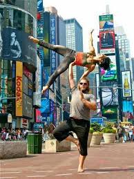 Acro Yoga Time Square I Love This Have You Seen Yoga In Any Crazy Places Elinor Shklaz Yoga Fitness Inspiration Acro Yoga Couples Yoga Poses