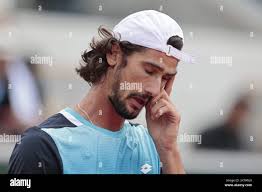 Lloyd Harris of South Africa plays a shot during his match against Nicolas  Jarry of Chile at the ATP Cup tennis tournament in Brisbane, Australia,  Monday, Jan. 6, 2020. (AP Photo/Tertius Pickard