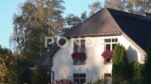 Farmhouse design may also have a modern look and touch. European Modern Farmhouse Building Exter Stock Video Pond5