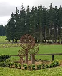 It has sharp metal points (barbs), which make climbing over it painful. Ideas