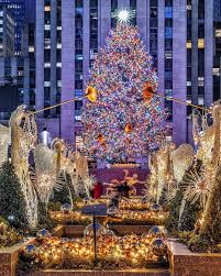 It S Lit The Rockefeller Center Christmas Tree In All Her Glory Rockefeller Center Christmas Rockefeller Center Christmas Tree Nyc Christmas