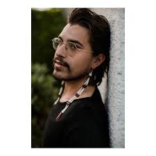 I have come a long way from peddling poems for pennies in downtown  Winnipeg”: An Interview with Joshua Whitehead