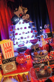 Movie night goes glam with hollywood theme party supplies & hollywood party decorations! Pin By Cynthia S Creations Chocolate On Hollywood Theme Party Hollywood Party Theme Hollywood Candy Candy Buffet