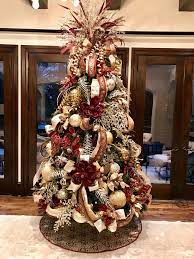 Technically, you can still drink it as is, but baijot has a few creative ideas to try. Elegant Burgundy Champagne And Gold Christmas Tree Designed By Arcadia Floral And Home De Christmas Tree Design Christmas Tree Decorations Gold Christmas Tree