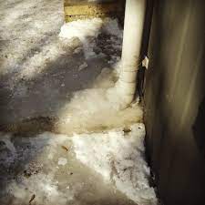 This prevents any flow at all and can do serious damage to the downspouts when the weather is cold enough to freeze (and expand) the trapped water. Frozen Downspouts What S Up Doesn T Always Come Down