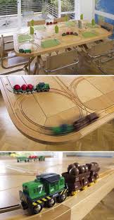 3 Dining Table Made Of Wood Tiles With Railroad Tracks For Food Trains 10 Genius Decorations Inspired By Train Or Toy Trains Set Wood Tile Model Train Table