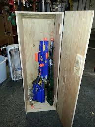This is a cabinet i built to hold my nerf guns. Pin On Nerf Night