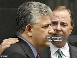 Former Enron chairman Kenneth Lay and his wife Linda pass office... News  Photo