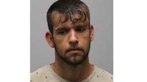 Man charged with stabbing another man with 2 children present