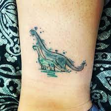 Traditional tattoo patterns dinosaur tattoos bicep tattoo dream tattoos sister tattoos body modifications tattoo drawings tattoo art animal hand tattoos deer skull tattoos skeleton hand tattoo tribal tattoos for men tattoos for women small tattoos for guys tattoo ink tatoos. Watercolour Mummy Baby Dinosaur Tattoo Watercolour Dinosaurtattoo Mummyandbaby Beautiful Ankletattoos Blue Tattoos For Kids Mommy Tattoos Baby Tattoos